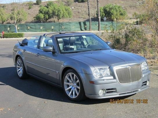 Illustration for article titled For $15,500, Will This 300C Drop-Top Flex Its Muscle?